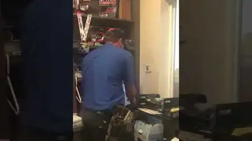 Man installing a thermostat